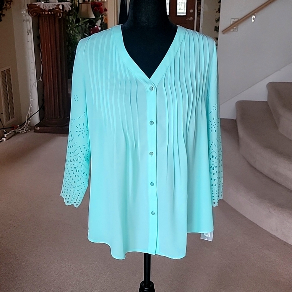 Seafoam green blouse by NY collection. Size small.